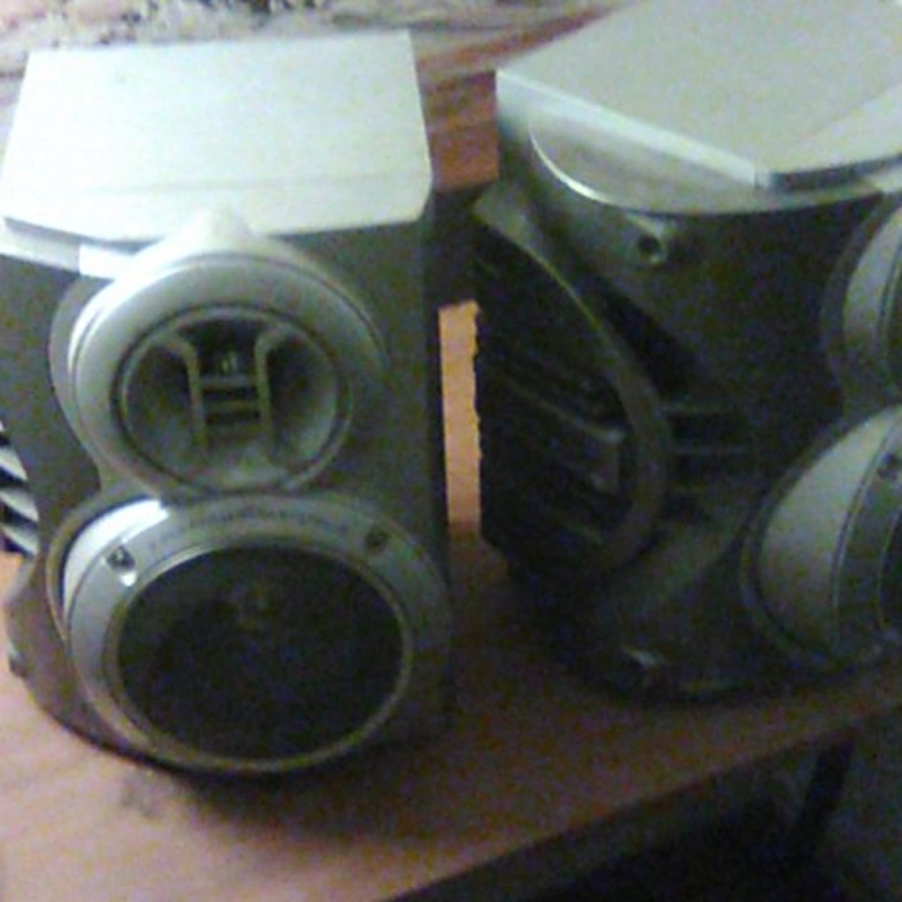 Sharp side firing bass system speakers